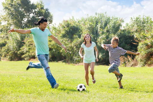 family with teenager playing in soccer 1398 2835